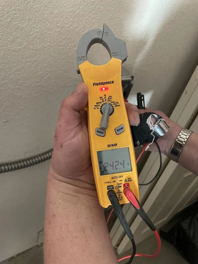Voltage testing with clamp meter during Aluminum Wiring Replacement in Colesville